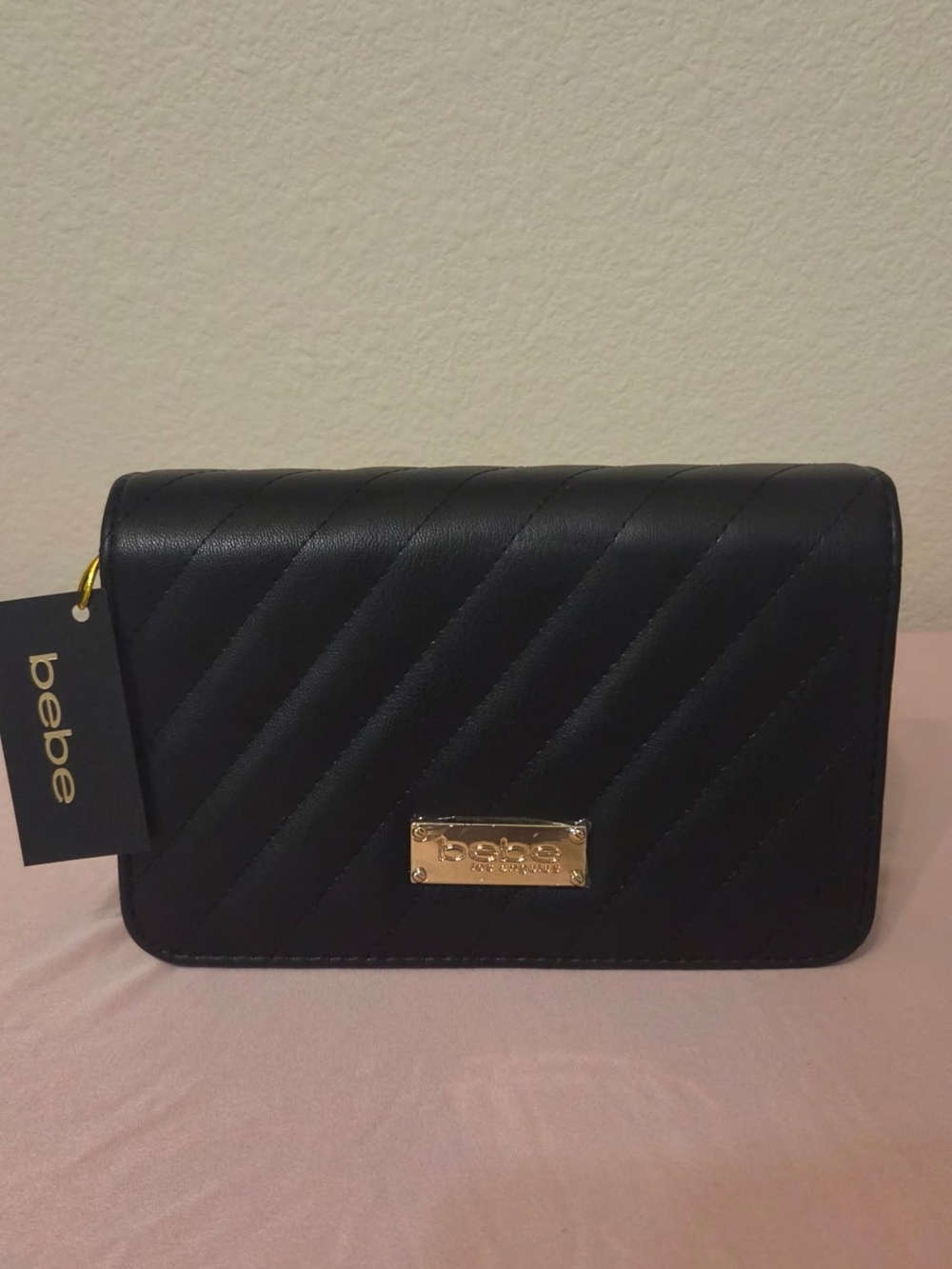 bebe Black Quilted Wristlet with Gold Plaque